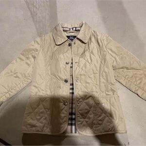 Burberry kids jacket, size 4. Blemish noted to front of jacket